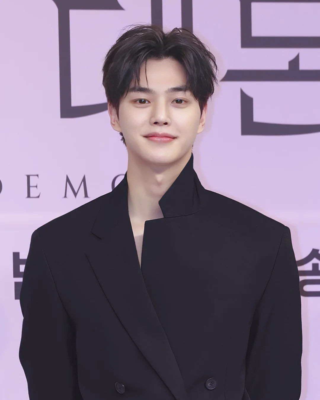Song Kang wearing a black suit at the My Demon press conference in November 2023