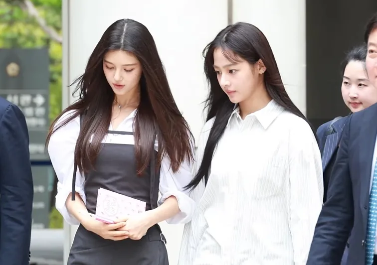 NewJeans members Minji and Danielle walking together in August 2025