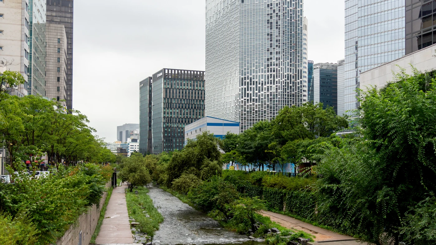 Cheonggyecheon stream running through central Seoul with tall buildings nearby